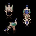 Multiple view of Close up of three beautiful peacock-shaped gold diamond ring