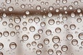 Multiple water drops or raindrops of different sizes on a window glass Royalty Free Stock Photo