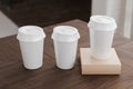 Multiple white take away coffee cup for mockup presentation branding design rendering minimalist