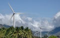 Multiple wind mills in a field in India Royalty Free Stock Photo