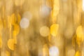 Multiple yellow bokeh lights with copy space on yellow background