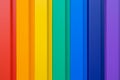 Multiples vertical color stripes on a metal wall - Royalty Free Stock Photo