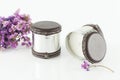 Multipurpose metal container decorated with leather. Used as a candle; photo on white background