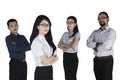 Multiracial business people with folded arms Royalty Free Stock Photo