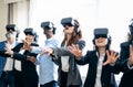 Multiracial business people wearing futuristic virtual reality glasses technology