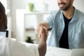 Multiracial businessmen shaking hands, multi-ethnic partnership Royalty Free Stock Photo