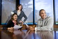 Multiracial businesspeople watching presentation Royalty Free Stock Photo