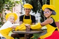 Multiracial children cook touching hands together forming pile. Friendship of multinational kids. Childhood. cooks in