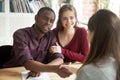 Multiracial couple excited with successful house purchase deal Royalty Free Stock Photo