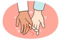 Multiracial couple hands linked with thread