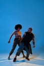 Flexible cool man and woman dancing hip hop dance Royalty Free Stock Photo