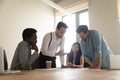 Multiracial employees talk brainstorming at team briefing in office Royalty Free Stock Photo