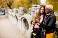 Multiracial female friends drinking coffee outdoor Royalty Free Stock Photo