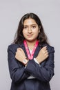 Female Model protesting against cancer with the closed fist near chest or breast