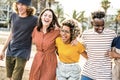 Multiracial friends group having fun on city street Royalty Free Stock Photo