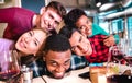 Multiracial friends taking drunk selfie at fancy winery restaurant - Happy friendship concept with young people