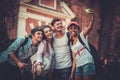 Multiracial friends tourists in an old city