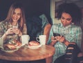 Multiracial girls in a cafe