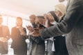 Multiracial group of business people clapping hands to congratulate their boss - Business company team, standing ovation after a Royalty Free Stock Photo