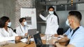 Multiracial group of doctors in face masks having medical conference Royalty Free Stock Photo