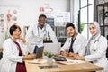 Multiracial group of doctors having sesssion at boardroom Royalty Free Stock Photo