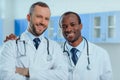 Multiracial group of doctors in medical uniforms in clinic Royalty Free Stock Photo