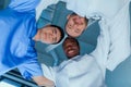 Multiracial group of doctors standing in circle in clinic Royalty Free Stock Photo