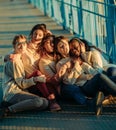 Multiracial group of friends from five young women