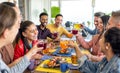 Multiracial group of people sitting in a table bar restaurant enjoying english brunch breakfast together talking and having fun Royalty Free Stock Photo