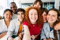 Multiracial group of young student people taking selfie while studying together Royalty Free Stock Photo