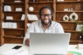 A multiracial guy using a hands free device for online communication Royalty Free Stock Photo