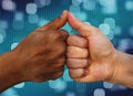 Multiracial hands together African American and Caucasian touching thumbs as team in promise sign of mutual trust representing