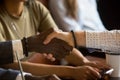 Multiracial handshake greeting during business meeting in cafe Royalty Free Stock Photo