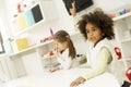 Multiracial liitle girls at playroom Royalty Free Stock Photo