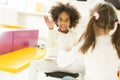 Multiracial liitle girls at playroom Royalty Free Stock Photo