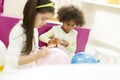 Multiracial liitle girls at playroom Royalty Free Stock Photo