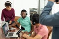 Multiracial male podcasters interviewing and recording podcast in creative office, copy space Royalty Free Stock Photo