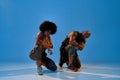 Multiracial man and girl dancing hip hop dance