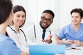 Multiracial medical team having meeting, discussing patients records Royalty Free Stock Photo