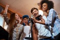 Multiracial music band performing in a recording studio Royalty Free Stock Photo