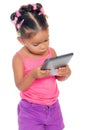 Multiracial small girl using a tablet computer