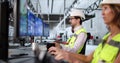 Multiracial team using Scada automation software