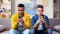 Multiracial teen boys chatting in social network instead of live communication