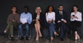 Multiracial applicants businesspeople sit on chairs prepare for job interview