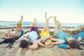 multiracial young people lying on blanket while spending time Royalty Free Stock Photo