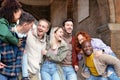 Multiracial young people walking happily on the street