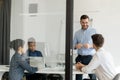 Multiracial young team discussing workshop moments and ideas Royalty Free Stock Photo