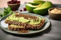 multiseed bread with avocado spread on a ceramic plate Royalty Free Stock Photo