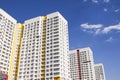 Multistory new modern apartment building against the blue sky. Stylish living block of flats. Newly built block of flats Royalty Free Stock Photo