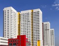 Multistory new modern apartment building against the blue sky. Stylish living block of flats. Newly built block of flats Royalty Free Stock Photo